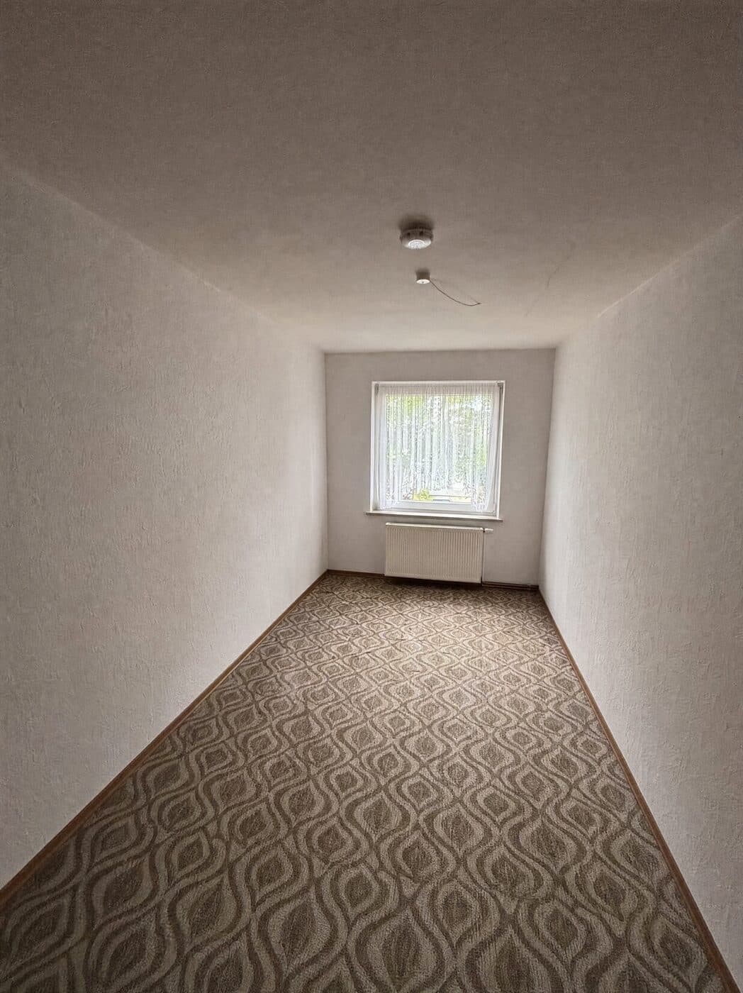 Derselbe Raum nach der Räumung, leer und besenrein übergeben